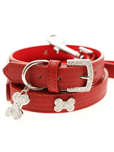 Red Leather Diamante Collar / Diamante Bone Charm & Lead Set - Sparkling Bling Collar and Lead Set. This textured red leather collar with a stitched edging has a crystal encrusted buckle with three large / bling sparkling diamante bones and a large sparkling diamante charm complete the look. A glamorous addition to the wardrobe of any trendy pooch. Matching lea...